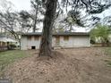 Backyard view of a single-story home at 4390 Mercer Rd, Decatur, GA 30035