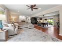 Open-concept living room connecting to a dining area with an outdoor view, perfect for entertaining at 1533 High Haven Ne Ct, Atlanta, GA 30329
