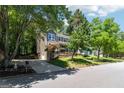 Inviting home with a long driveway and lush green lawn, showcasing the property's curb appeal and outdoor space at 4031 E Meadow Dr, Duluth, GA 30096
