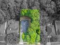 Aerial shot of a home featuring mature tree coverage and serene surroundings at 150 Glynn Addy Dr, Stockbridge, GA 30281