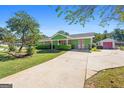 Charming home with spacious driveway and additional storage shed at 120 Greenview Ter, Mcdonough, GA 30253
