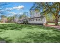 Spacious yard surrounds this ranch-style home, offering plenty of room at 308 Lee Thompson Rd, Moreland, GA 30259