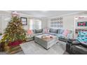 Inviting living room with a comfortable sectional sofa and festive Christmas decor at 308 Lee Thompson Rd, Moreland, GA 30259
