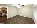 Cozy living room with wood floors and ceiling fan at 2239 Nelms Sw Dr, Atlanta, GA 30315