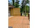 Spacious deck features a privacy screen and black metal railings at 6072 Holiday Blvd, Forest Park, GA 30297