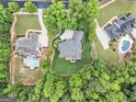 Aerial view of a home with lush landscaping at 115 Edgewood Pkwy, Fayetteville, GA 30215