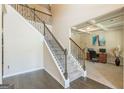 Foyer with hardwood floors and a staircase leading to the second floor at 171 Osier Dr, Mcdonough, GA 30252
