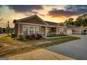 Inviting exterior showcasing neutral siding, a charming front porch, and well-maintained landscaping at 2929 Rambler Dr, Loganville, GA 30052