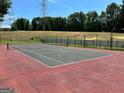 Outdoor tennis court available in the community at 1503 Wingate Way # 1503, Sandy Springs, GA 30350
