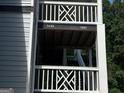 Close-up of the exterior of an apartment building showing unit numbers and balconies at 3480 Shepherds Path, Decatur, GA 30034