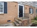Close up shows brick with door and surrounding siding at 3626 Buford # C1, Brookhaven, GA 30329