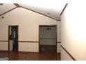 Hallway shows wood trim detail, neutral paint colors, and hardwood floors at 3857 Pointers Sw Way, Conyers, GA 30094