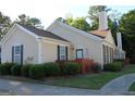 Cozy home featuring well manicured landscaping and a fenced in patio at 175 Camry Ln, Grayson, GA 30017