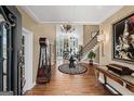 Grand foyer with hardwood floors, high ceilings, elegant chandelier, and staircase at 162 Daltree Ct, Marietta, GA 30068