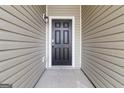 Close-up of the front door, featuring a classic design and a welcoming entrance to the home at 2268 Nicole Dr, Hampton, GA 30228
