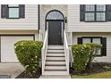 Covered front entrance with steps leading up to the front door at 4733 Julian Way, Acworth, GA 30101