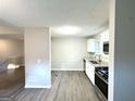 Bright kitchen with stainless steel appliances, modern finishes, and wood-look floors at 3170 W Point Cir, Douglasville, GA 30135