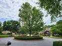 Picturesque neighborhood with a tree-lined cul-de-sac and beautifully landscaped yards at 151 Overhill Point, Alpharetta, GA 30005