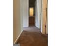 Carpeted hallway with doorways leading to rooms at 8170 Oakley Cir # 2, Union City, GA 30291