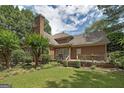 Spacious backyard with a wooden deck, perfect for outdoor entertaining at 170 Glen Eagle Way, Mcdonough, GA 30253