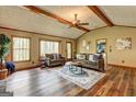Comfortable living room offering plenty of natural light and access to the outdoors at 3452 Monica Sw Ln, Conyers, GA 30094