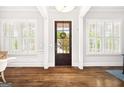 Bright and airy foyer with gleaming hardwood floors and abundant natural light at 1596 Fearn Ne Cir, Brookhaven, GA 30319