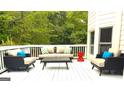 Comfortable outdoor seating area, perfect for entertaining and enjoying the outdoors at 30 Highlands Ln, Oxford, GA 30054