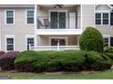 Close up view of a condo featuring a private balcony with outdoor seating at 1017 Ridgefield Dr, Peachtree City, GA 30269
