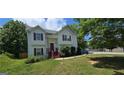 Charming two-story home with well-maintained lawn and beautiful landscaping in a desirable neighborhood at 8436 Cyprus Ridge Way, Douglasville, GA 30134