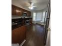 Eat-in kitchen featuring stainless steel appliances and a bay window at 6420 Pinebark Way, Morrow, GA 30260
