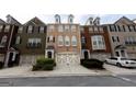 Charming townhomes with well-maintained front yards and garages in a desirable neighborhood at 6089 Indian Wood Cir, Mableton, GA 30126