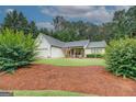Charming single-Gathering home features a well-maintained lawn and inviting front porch at 160 Laurel Ln, Social Circle, GA 30025
