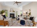 Cozy living room featuring a fireplace, plush seating, and elegant decor at 10 Wigwam Cir, Whitesburg, GA 30185