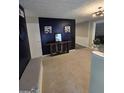 Stylish entryway featuring elegant wall decor and modern accents at 10178 Top Tree Ct, Jonesboro, GA 30238