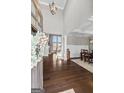 Inviting foyer boasts high ceilings and hardwood floors, showcasing an open and bright entryway at 240 Sturry Dr, Mcdonough, GA 30252