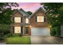 Beautiful brick home with black shutters and a large front yard in a peaceful neighborhood setting at 2009 Parador Aly, Mcdonough, GA 30253