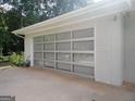This home features a glass paned automatic garage door at 3025 Ebenezer Rd., Se Rd, Conyers, GA 30094