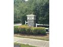 Fairway Bend neighborhood entrance sign with stone base and manicured landscaping at 3381 Walkers Ridge Rd, Dacula, GA 30019