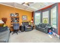 Comfortable living room with an array of seating options and large windows at 150 Bellemeade Ct, Fayetteville, GA 30215