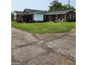 This home has a large backyard with a covered patio and covered porch at 619 E College St, Bowdon, GA 30108