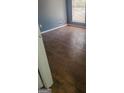 Bedroom with wood-look tile flooring, a window, and neutral-colored walls at 366 Montgomery Pl, Jonesboro, GA 30238
