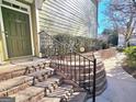 Inviting front entrance with stone steps and wrought iron railing leads to the front door at 2540 Willow Grove Road Nw Rd # 15, Acworth, GA 30101