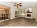 Spacious living room featuring vaulted ceilings, fireplace, and natural light at 2624 Windridge Dr, Acworth, GA 30102