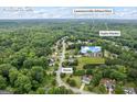 Auburn, GA aerial view of neighborhood, highlighting home's location near Lawrenceville-Athens Hwy and Ingles Market at 301 Bradford Ct, Auburn, GA 30011