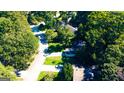 Overhead shot showcasing the tree-lined neighborhood and the property's location within the community at 8846 Wesley Pl, Jonesboro, GA 30238