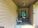 Welcoming front porch with seating, perfect for enjoying the outdoors and greeting guests at 6884 Shangrila Way, Riverdale, GA 30296