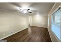 Spacious living room showcasing hardwood floors and neutral walls at 3158 Wisteria Way, East Point, GA 30344