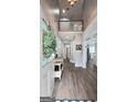 Bright foyer with high ceilings, hardwood floors, and open floor plan at 100 Rabbits Run, Fayetteville, GA 30214