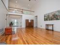 Spacious living room with hardwood floors and an upper-level view at 7392 N Mitchell Ct, Villa Rica, GA 30180