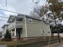 View of home featuring a charming balcony and fenced yard at 821 Beckwith Sw St, Atlanta, GA 30314